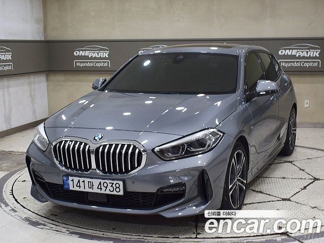 BMW 1-Series 2022 — photo 1