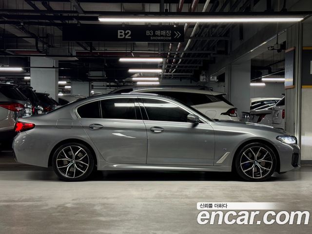 BMW 5-Series 2023 — photo 20