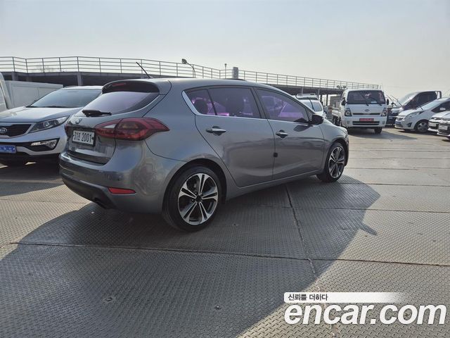 Kia K3 2014 — photo 4