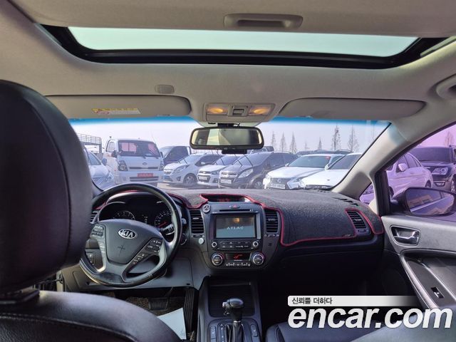 Kia K3 2014 — photo 11