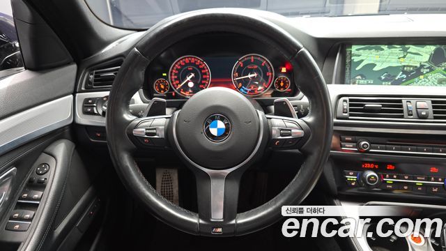 BMW 5-Series 2014 — photo 13
