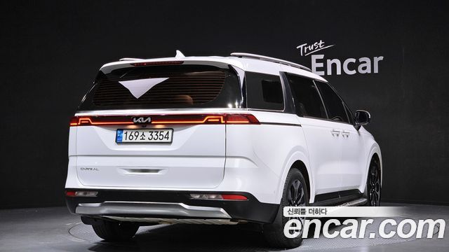 Kia Canival 2023 — photo 2