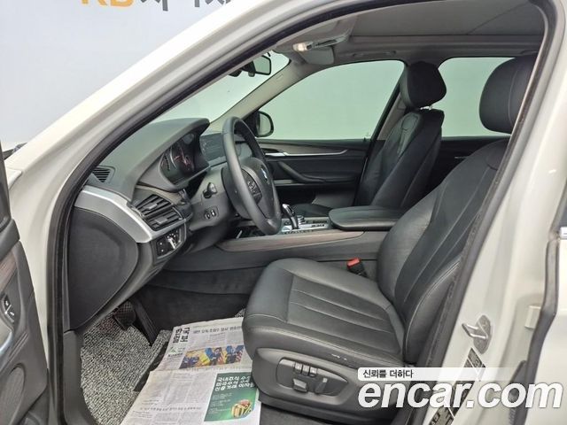BMW X5 2014 — photo 11