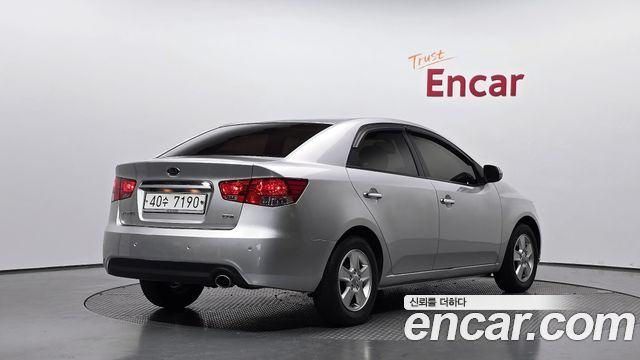Kia Porte 2012 — photo 2