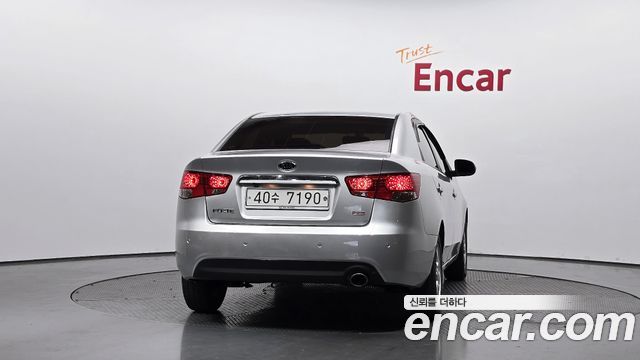 Kia Porte 2012 — photo 4