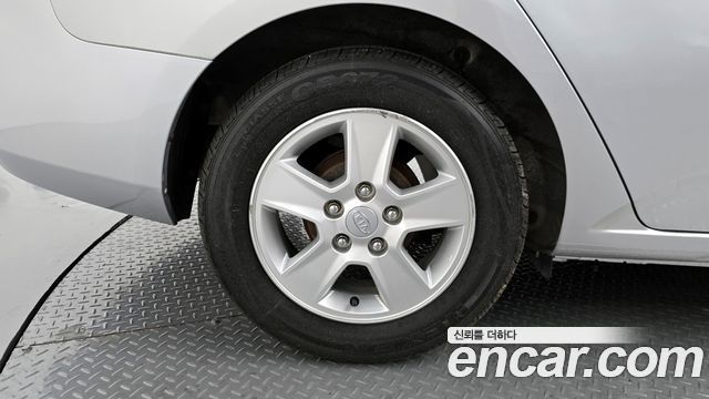 Kia Porte 2012 — photo 5