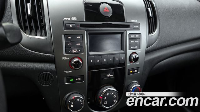 Kia Porte 2012 — photo 21