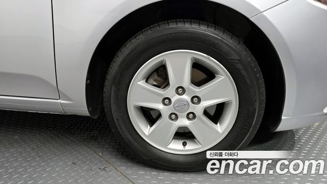 Kia Porte 2012 — photo 7
