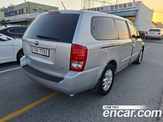 Kia Canival 2013 — photo 2