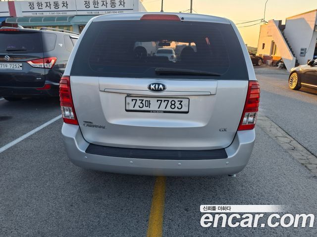 Kia Canival 2013 — photo 4