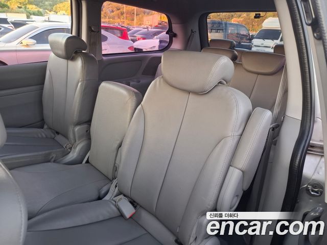 Kia Canival 2013 — photo 8