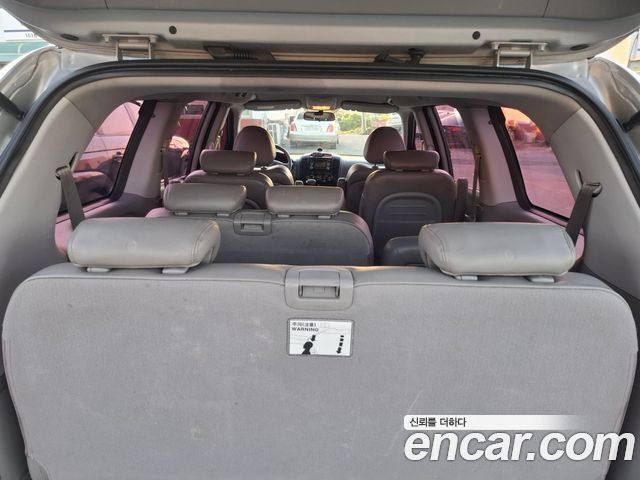 Kia Canival 2013 — photo 9