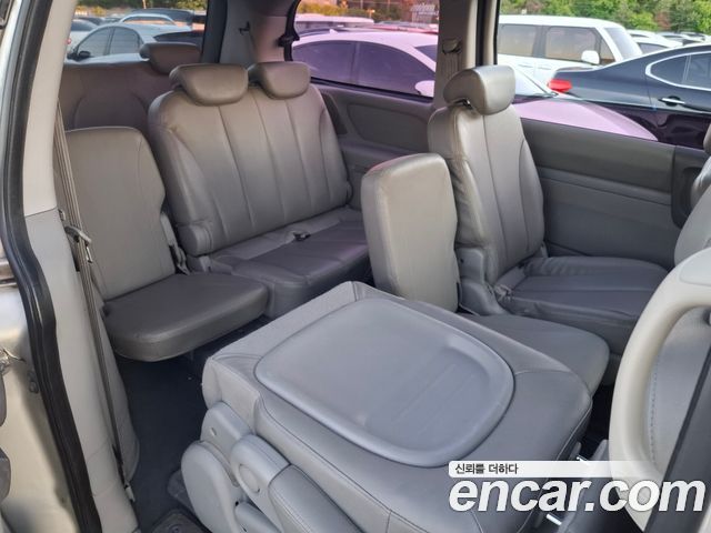 Kia Canival 2013 — photo 10