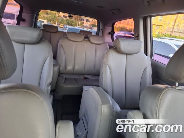 Kia Canival 2013 — photo 11