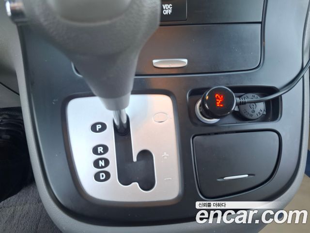 Kia Canival 2013 — photo 17