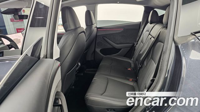 Tesla Model Y 2025 — photo 18