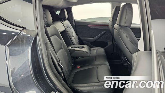 Tesla Model Y 2025 — photo 16