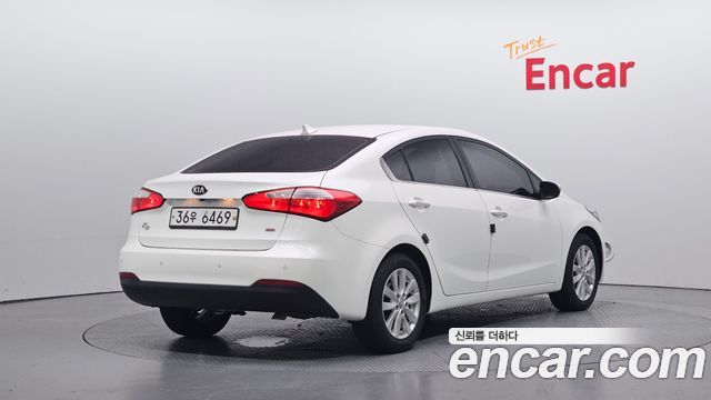 Kia K3 2013 — photo 2