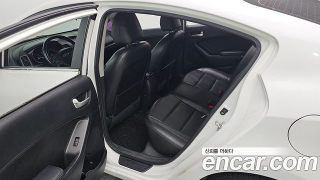 Kia K3 2013 — photo 19