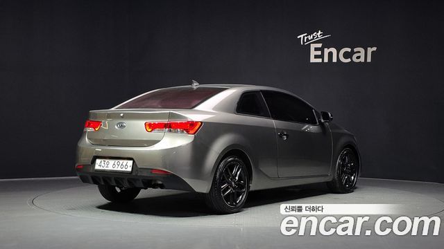 Kia Porte 2012 — photo 2