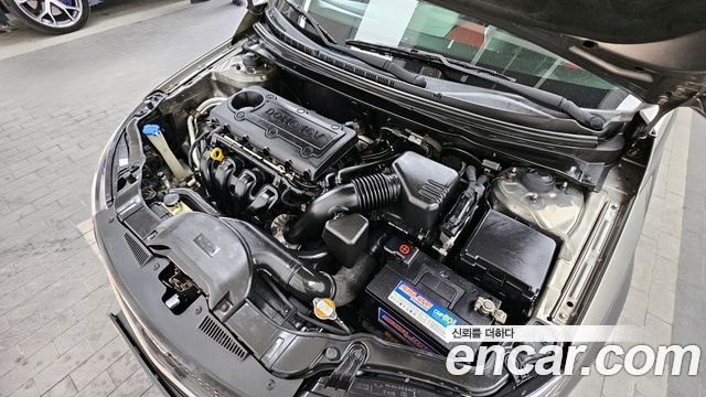 Kia Porte 2012 — photo 6