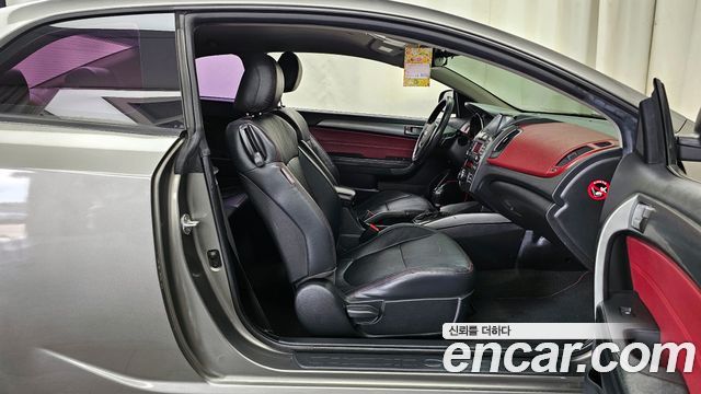 Kia Porte 2012 — photo 11