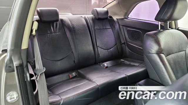 Kia Porte 2012 — photo 12