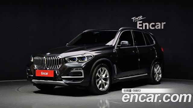 BMW X5 2021 — photo 1