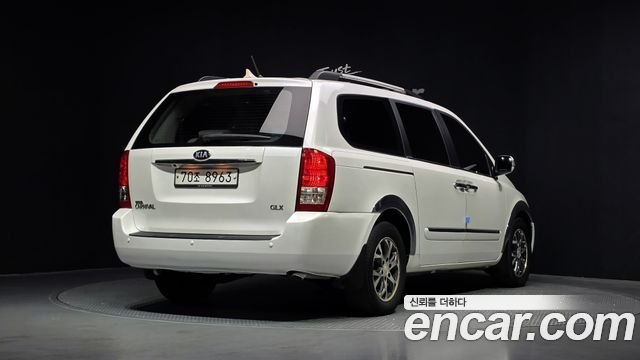 Kia Canival 2014 — photo 2