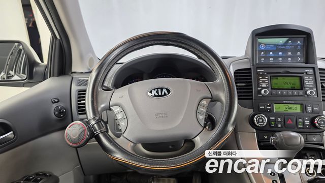 Kia Canival 2014 — photo 19