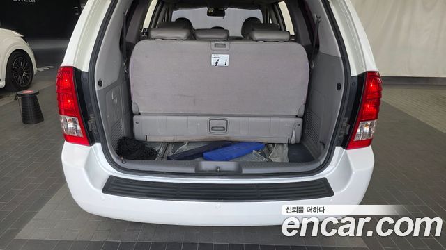 Kia Canival 2014 — photo 22