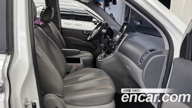 Kia Canival 2014 — photo 16