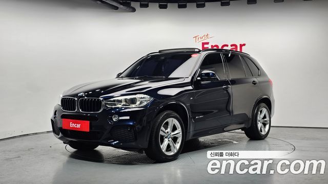 BMW X5 2018 — photo 1