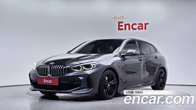 BMW 1-Series 2021 — photo 1
