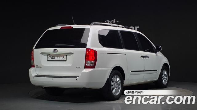 Kia Canival 2013 — photo 2