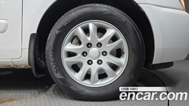 Kia Canival 2013 — photo 5