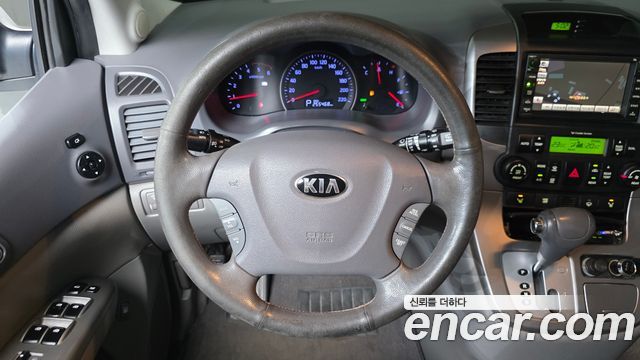 Kia Canival 2013 — photo 13