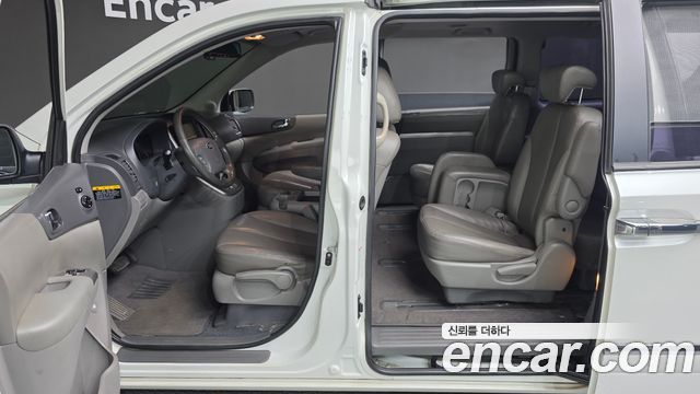 Kia Canival 2013 — photo 17