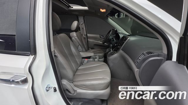 Kia Canival 2013 — photo 18