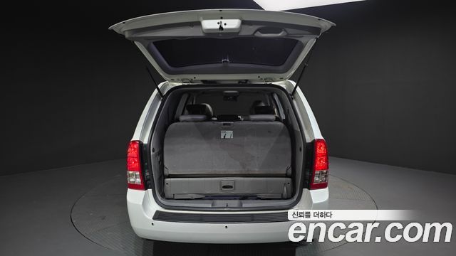 Kia Canival 2013 — photo 19