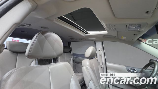 Kia Canival 2013 — photo 20