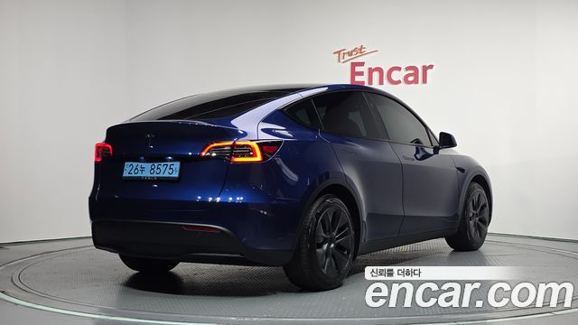 Tesla Model Y 2025 — photo 2