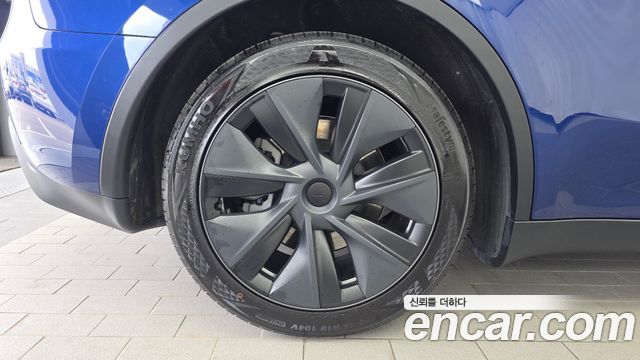 Tesla Model Y 2025 — photo 5