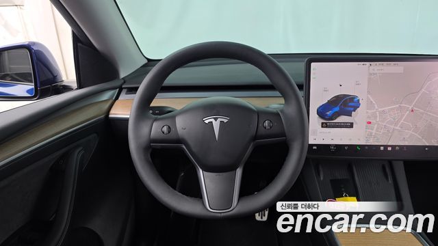 Tesla Model Y 2025 — photo 13