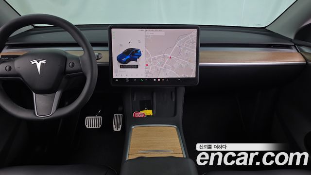 Tesla Model Y 2025 — photo 14