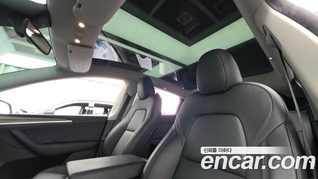 Tesla Model Y 2025 — photo 18