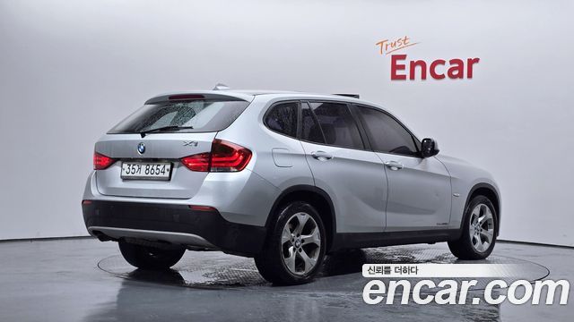 BMW X1 2010 — photo 2
