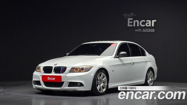 BMW 3-Series 2011 — photo 1