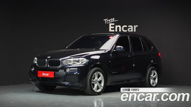 BMW X5 2018 — photo 1