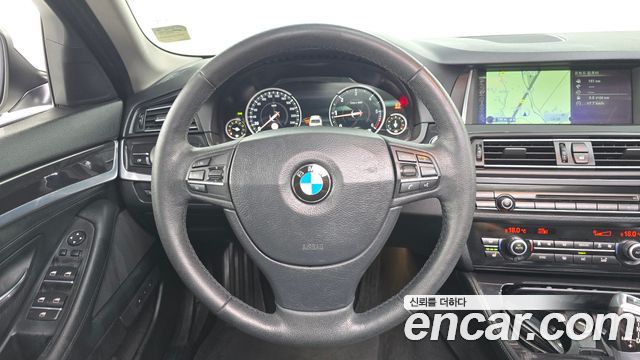 BMW 5-Series 2014 — photo 14